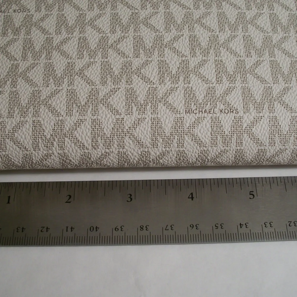 Michael Kors Signature Smartphone Wallet  In White Logo Canvas Print Wristlet